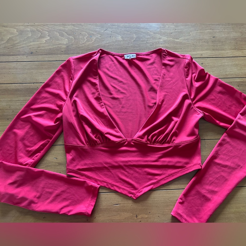 Red long sleeve deep V neck Garage top